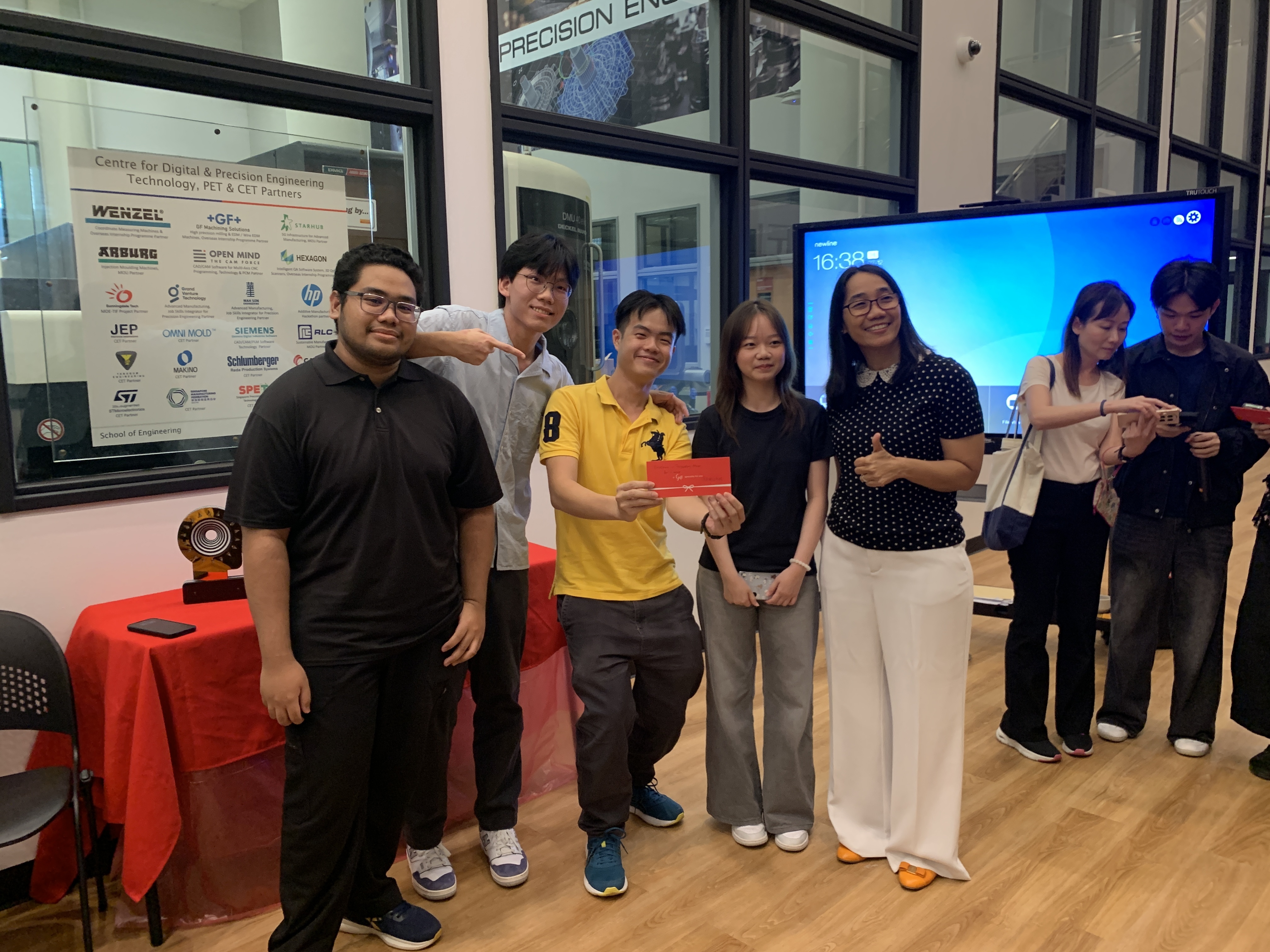 Nanyang Polytechnic NXplorers Team, Waterloop, pictured with Shell Singapore leader and Cluster General Manager, Southeast Asia, Shell Lubricants, Nordarlina Mohd Sib,