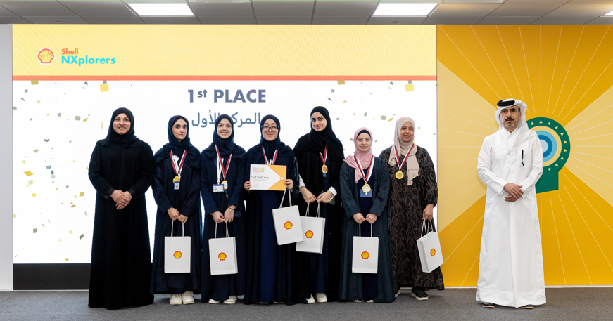 The winners Qatar High School students accept award